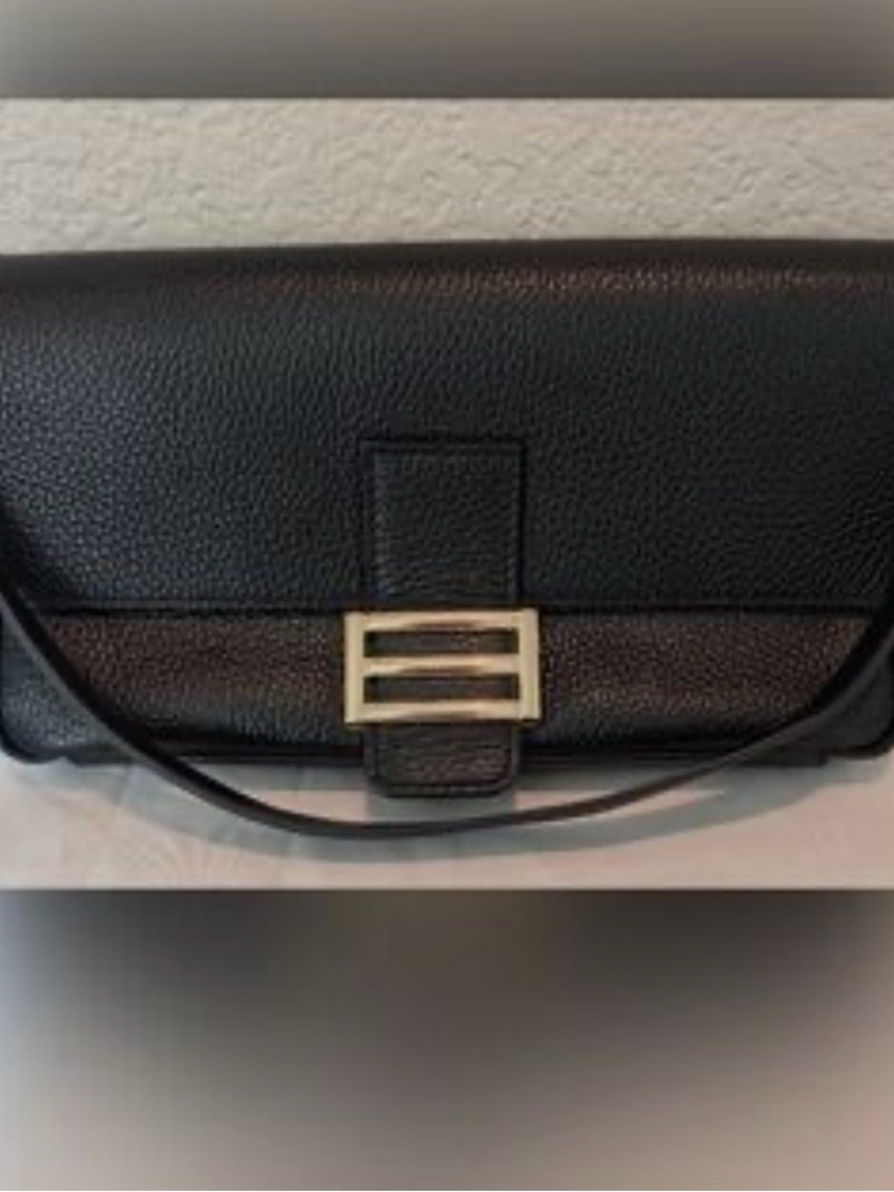 Black Leather Shoulder Bag with Gold Buckle Accent